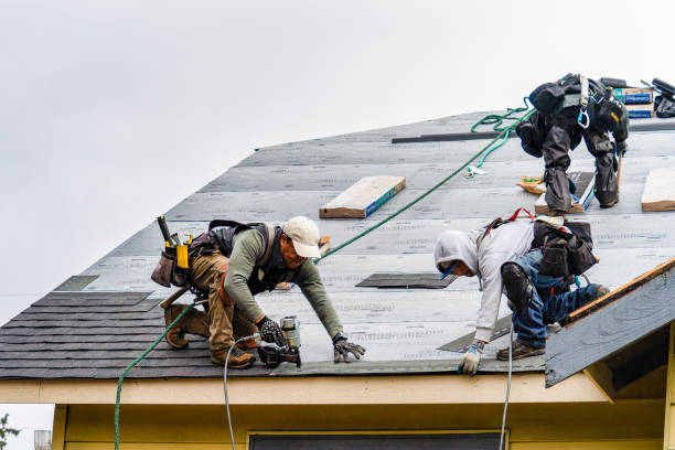 Professional Gutter Installation technician working in Three Rivers, MA
